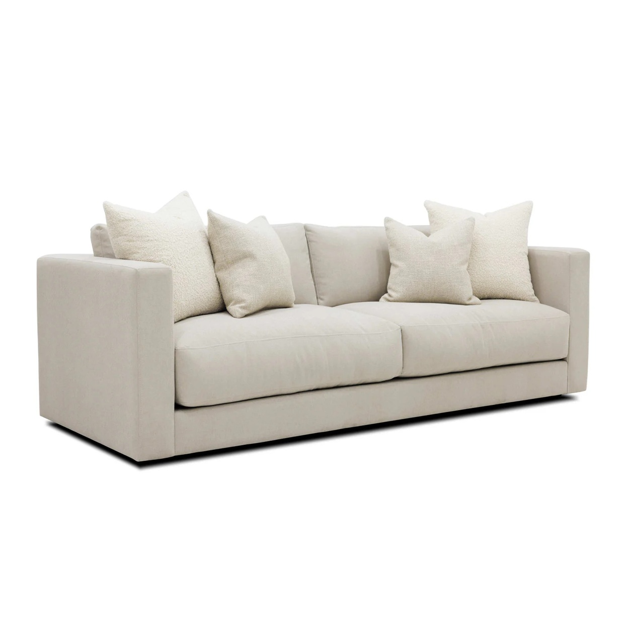 Pale grey sofa with high square arms, and extra thick seat cushions.