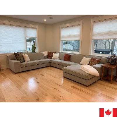 Light grey sectional sofa. U shapes with a chaise.