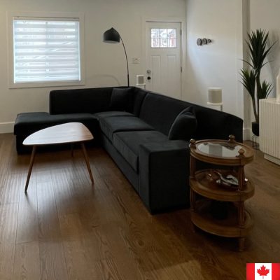 Sectional sofa in black velvet.